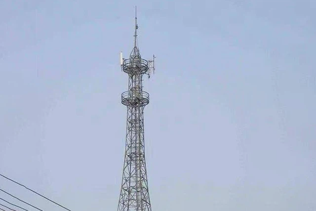 A roof-top telecommunication tower A roof-top telecommunication tower